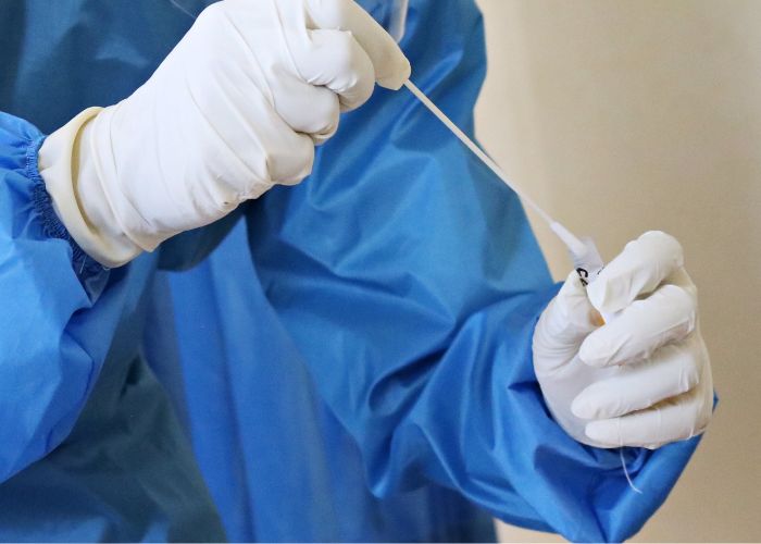 medical practitioner wearing nitrile gloves